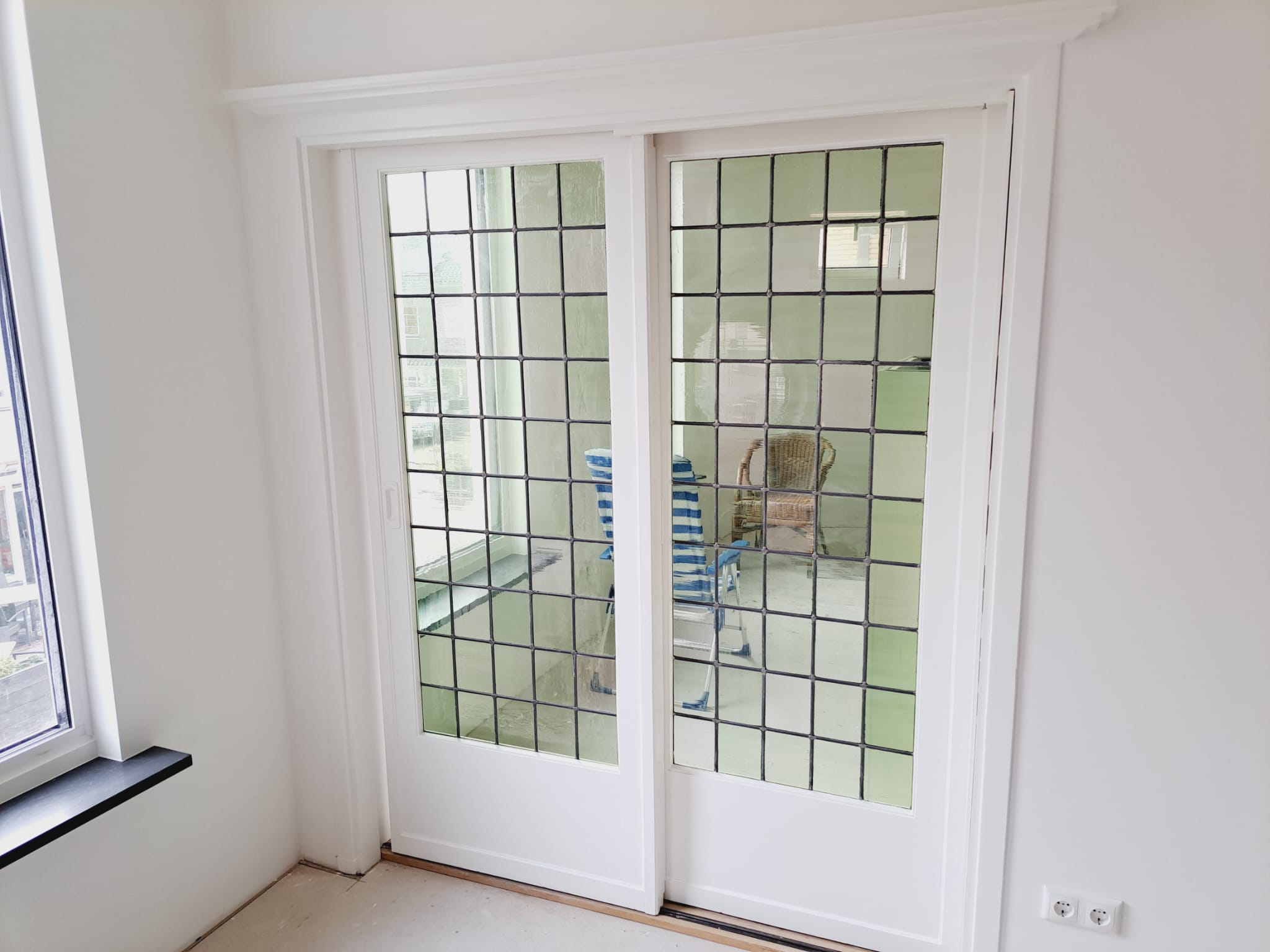 Schuifdeur na schilderwerk